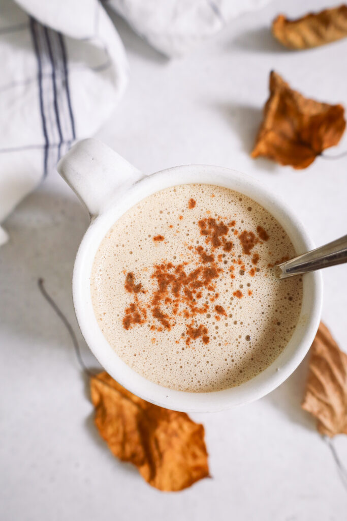 pumpkin spice latte with a linen and fall leaves